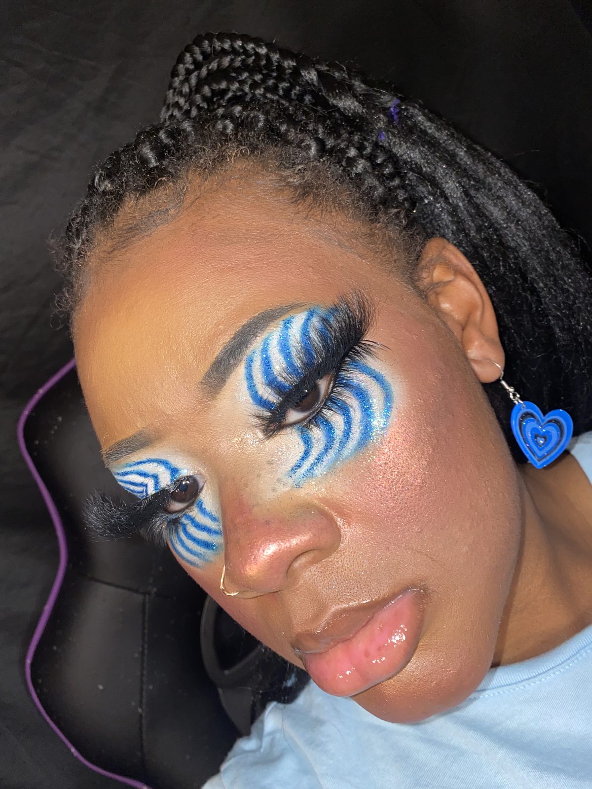 Blue graphic swirl eyeliner look