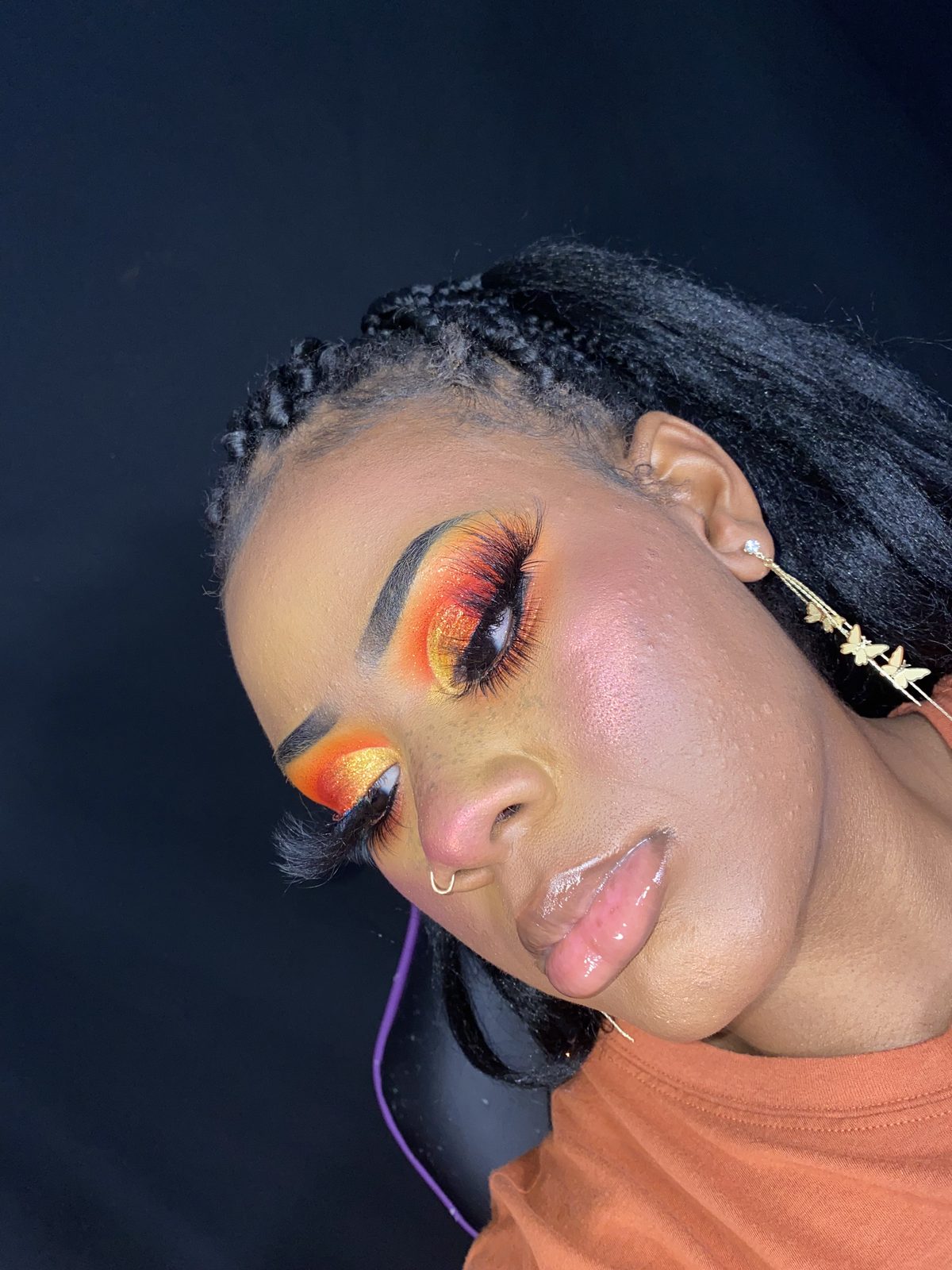 Orange and red glitter cut crease side profile